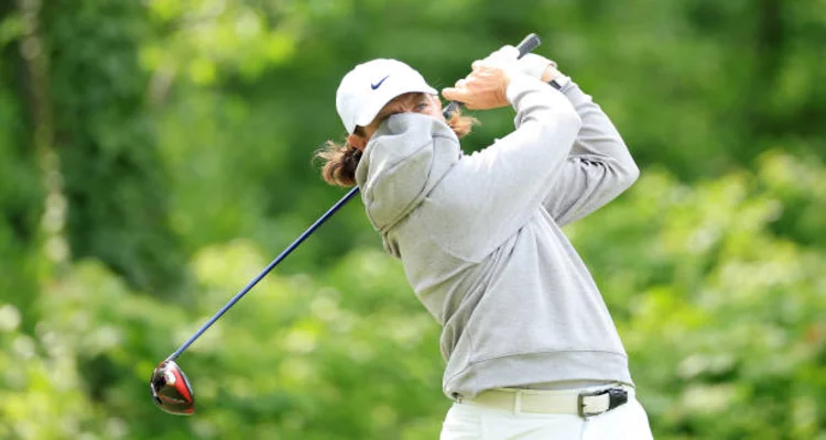 Morgan Wallen playing game wearing hoodie